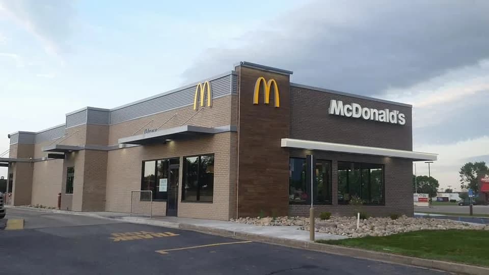 Commercial restaurant exterior with brick and stone masonry