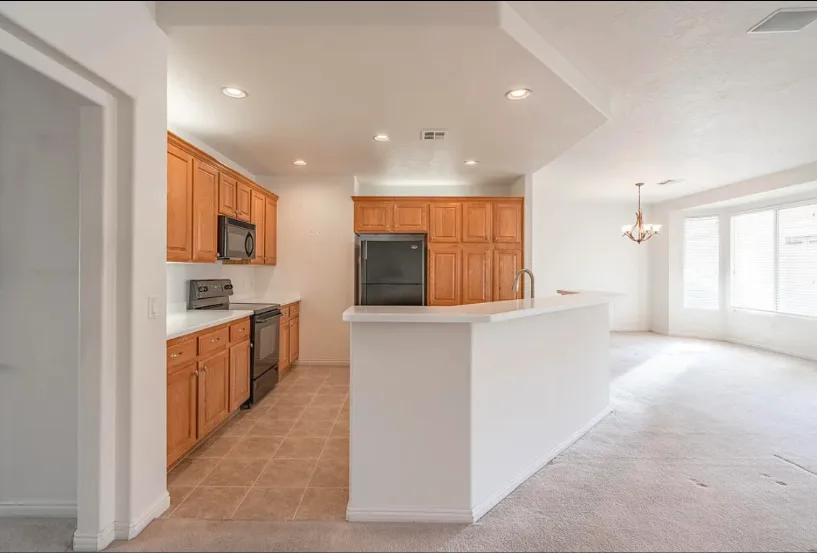 Open kitchen and living area following an interior renovation.