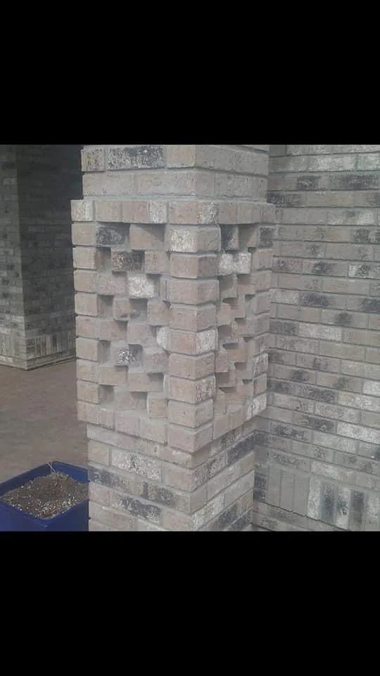Stacked-stone fireplace corner and hearth detail.