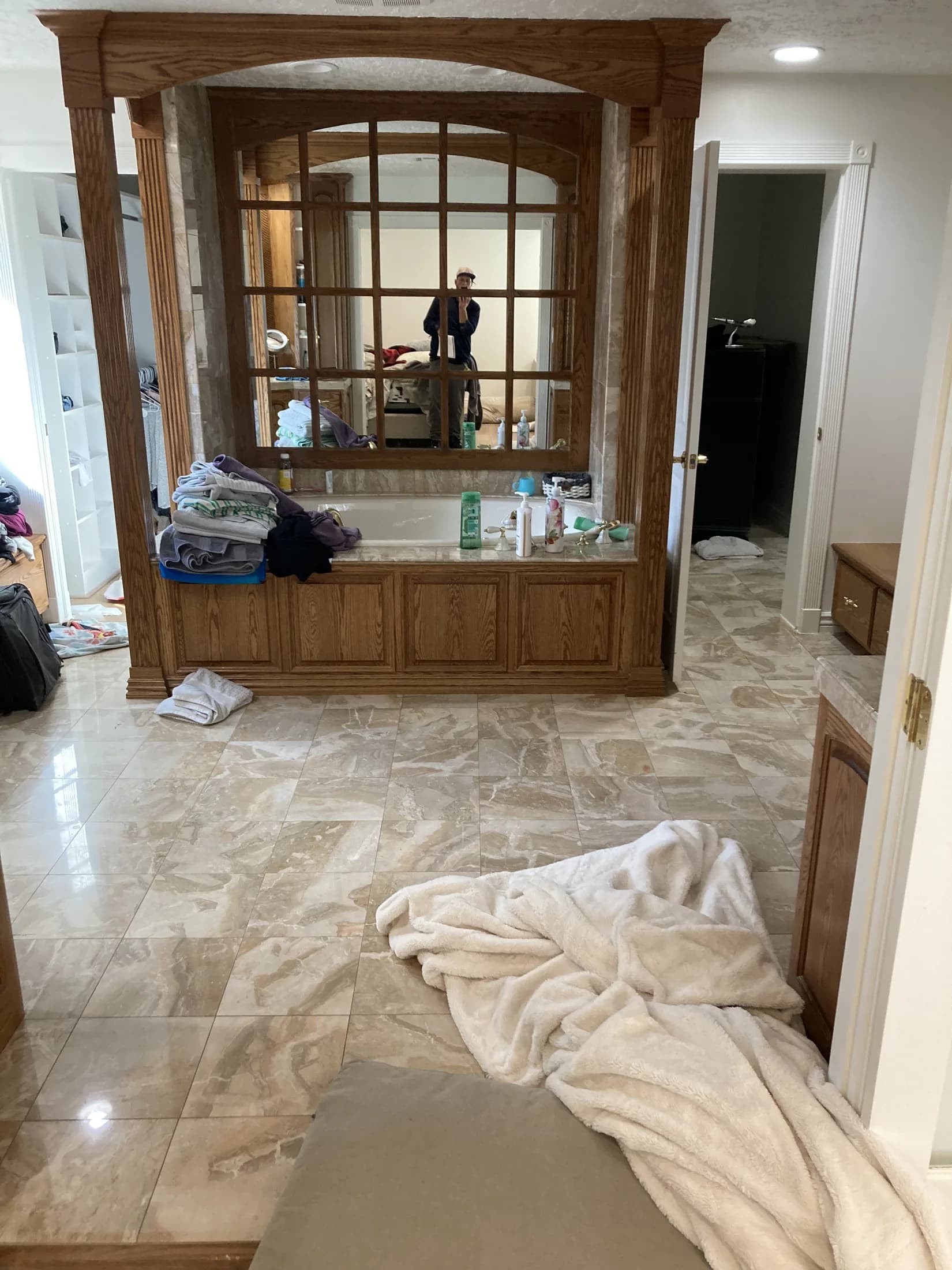 Stone-tile interior installation protected during construction.